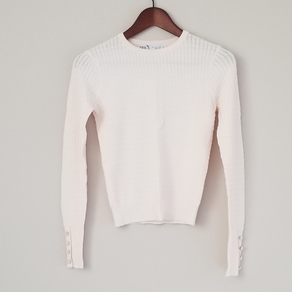 Knit top with pearl buttons